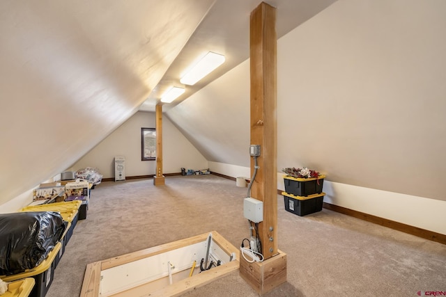 32 Cinnamon Mountain Rd, Mount Crested Butte, CO 81225 - additional living space with carpet, vaulted ceiling, and baseboards