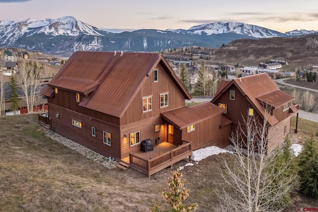 32 Cinnamon Mountain Rd, Mount Crested Butte, CO 81225 - back of house featuring a deck with mountain view
