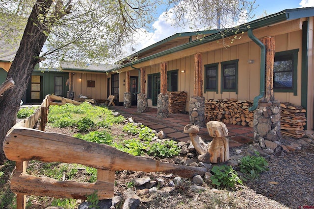 10491 54 7/10 Rd, Molina, CO 81646 - back of house featuring board and batten siding