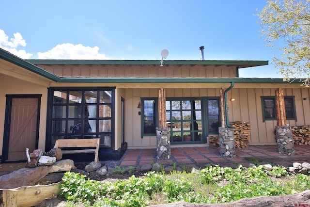 10491 54 7/10 Rd, Molina, CO 81646 - property entrance with board and batten siding and covered porch