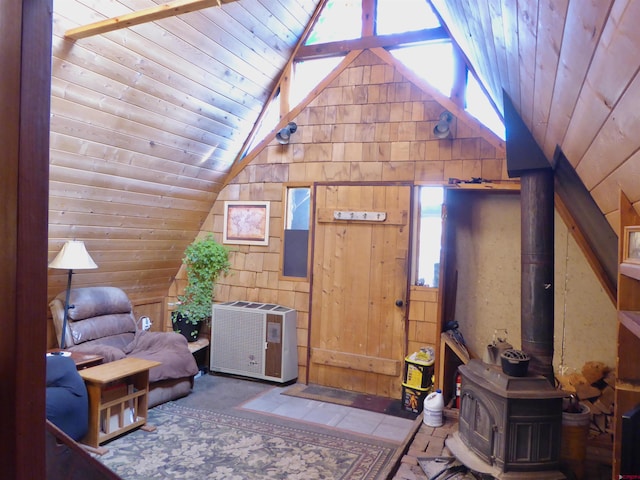 858 Reese St, Silverton, CO 81433 - additional living space featuring wood walls, lofted ceiling, a wood stove, and heating unit