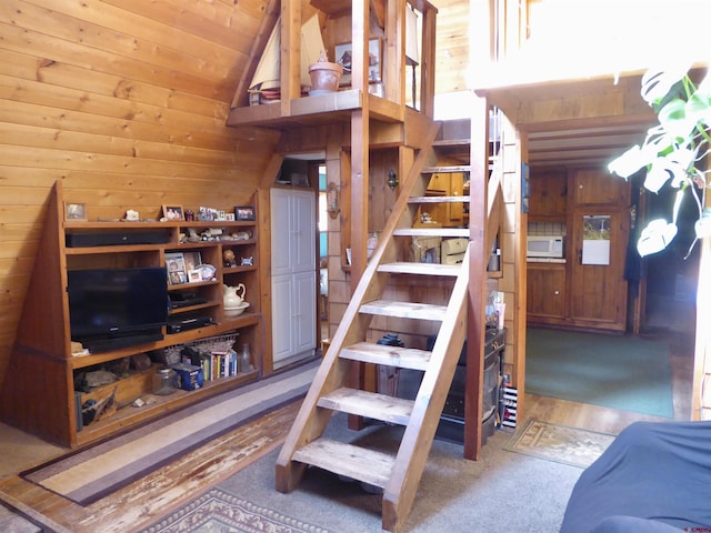 858 Reese St, Silverton, CO 81433 - stairs featuring wooden walls, wooden ceiling, and high vaulted ceiling