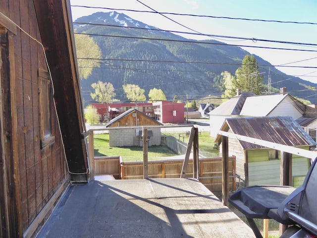 858 Reese St, Silverton, CO 81433 - view of patio / terrace with a mountain view, a storage shed, and an outdoor structure