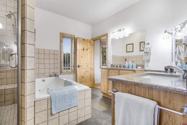 584 Oren Rd, Pagosa Springs, CO 81147 - bathroom with a shower stall, a tub with jets, and vanity