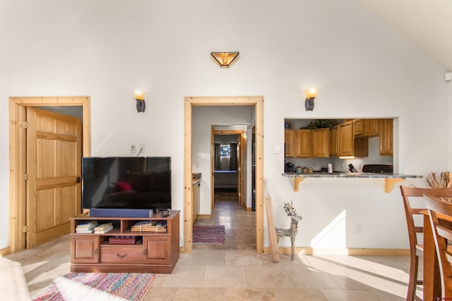 584 Oren Rd, Pagosa Springs, CO 81147 - living room with high vaulted ceiling and baseboards