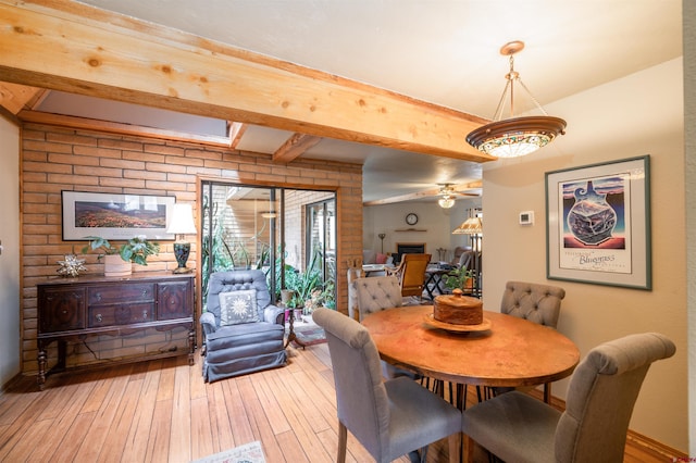 520 Los Ranchitos Dr, Durango, CO 81301 - dining room featuring light wood-style flooring, beam ceiling, ceiling fan, and baseboards