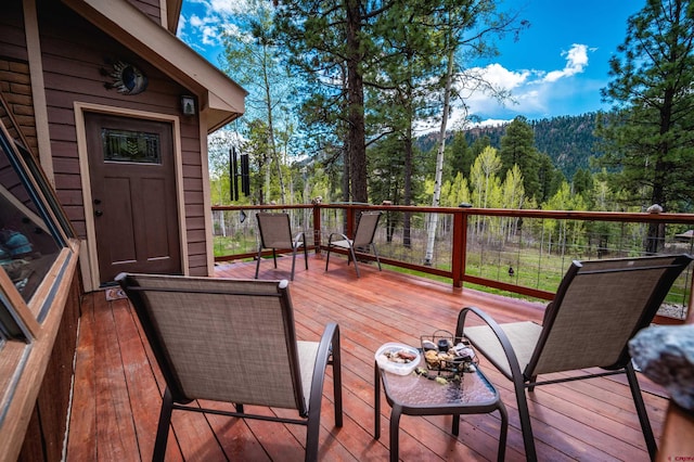 520 Los Ranchitos Dr, Durango, CO 81301 - wooden deck with a view of trees
