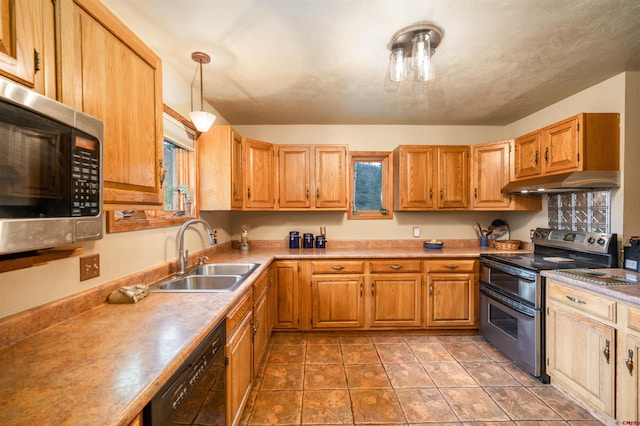 520 Los Ranchitos Dr, Durango, CO 81301 - kitchen featuring stainless steel appliances, under cabinet range hood, a sink, pendant lighting, and light countertops