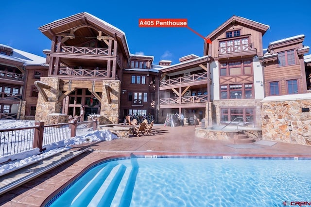 community pool featuring a patio