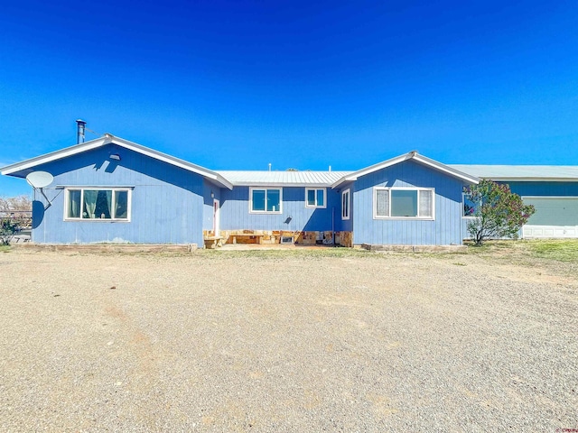 175 County Road J6, Egnar, CO 81325 - rear view of property with metal roof