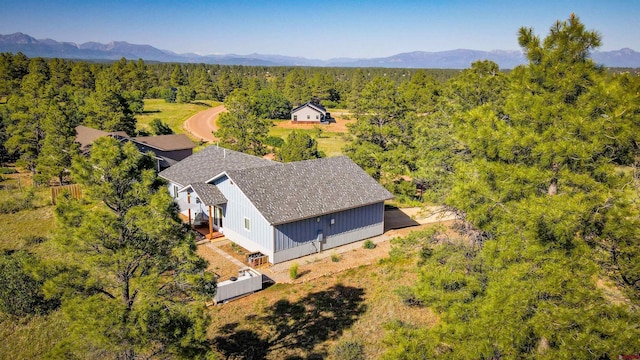 1223 Trails Blvd, Pagosa Springs, CO 81147 - view of subject property featuring a heavily wooded area and a mountainous background