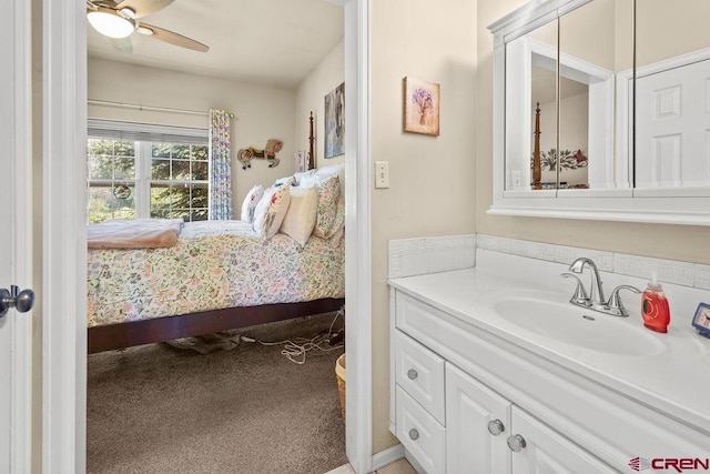1060 Alta Vista Dr, Craig, CO 81625 - bathroom featuring connected bathroom, vanity, and ceiling fan