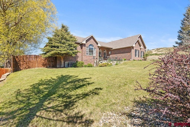 1060 Alta Vista Dr, Craig, CO 81625 - view of home's exterior with brick siding