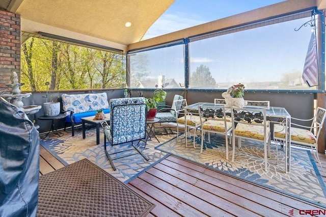 1060 Alta Vista Dr, Craig, CO 81625 - sunroom featuring vaulted ceiling, plenty of natural light, and an outdoor living space