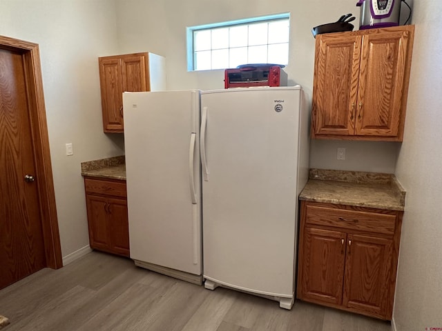 20 Meadow Ln, Monte Vista, CO 81144 - washroom with light wood-style flooring