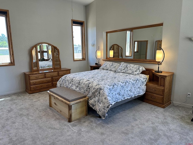 20 Meadow Ln, Monte Vista, CO 81144 - bedroom featuring multiple windows, carpet floors, and baseboards