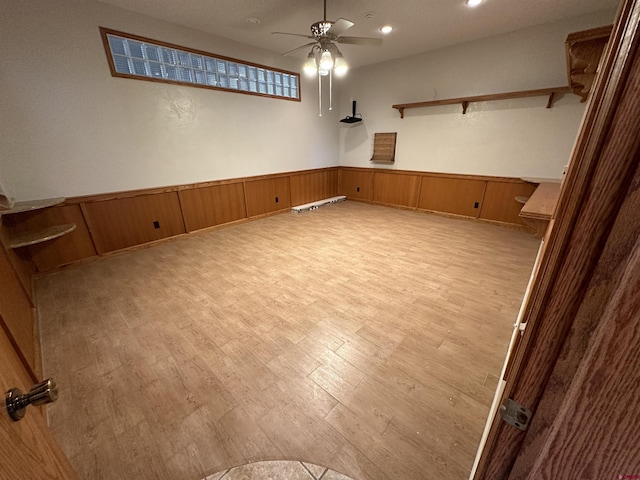 20 Meadow Ln, Monte Vista, CO 81144 - unfurnished room featuring a ceiling fan, light wood-type flooring, a wainscoted wall, and recessed lighting