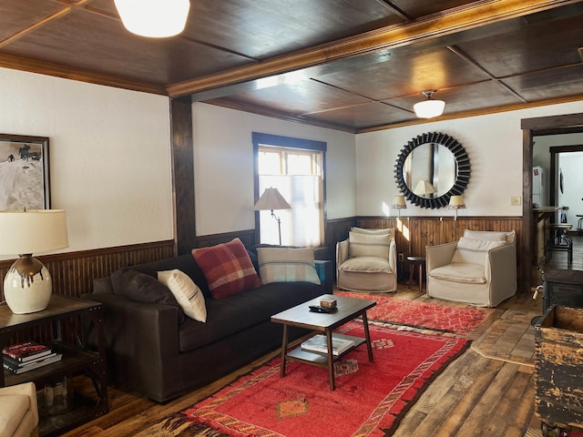 209 Whiterock Ave, Crested Butte, CO 81224 - living room with a wainscoted wall, wood-type flooring, crown molding, and wood walls