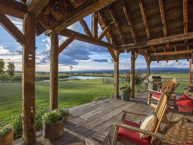 1789 County Road 44z S, Norwood, CO 81423 - deck with a water view, a lawn, and grilling area