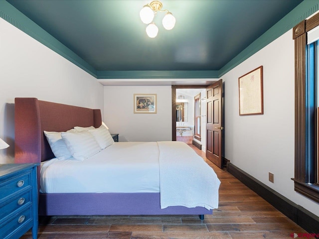 645 2nd St, Ouray, CO 81427 - bedroom with dark wood-style floors and baseboards
