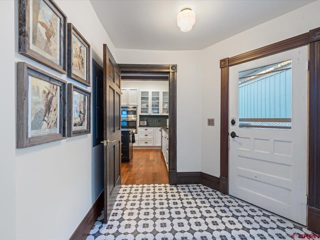 645 2nd St, Ouray, CO 81427 - entrance foyer with baseboards and dark wood-style flooring