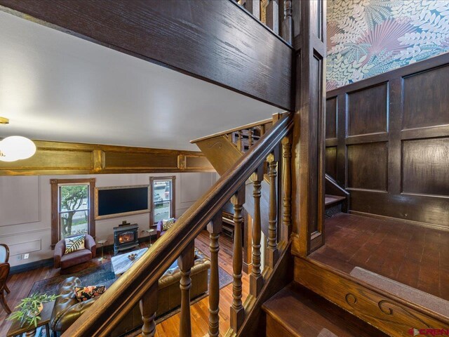 645 2nd St, Ouray, CO 81427 - staircase featuring a decorative wall and wood finished floors