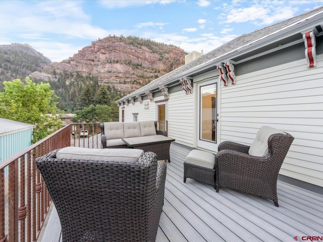 645 2nd St, Ouray, CO 81427 - wooden deck with a mountain view and outdoor lounge area