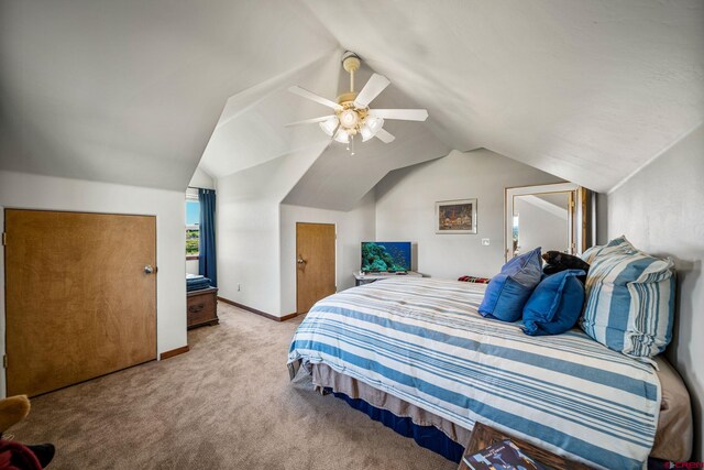 11611 Rd 28.1, Dolores, CO 81323 - bedroom featuring carpet floors, vaulted ceiling, and a ceiling fan