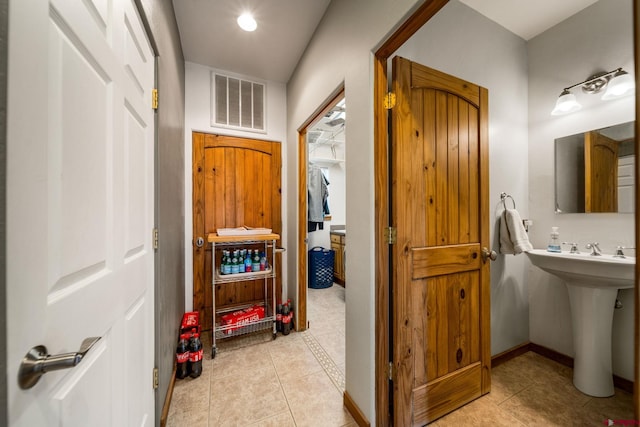 11611 Rd 28.1, Dolores, CO 81323 - bathroom featuring tile patterned flooring and a sink