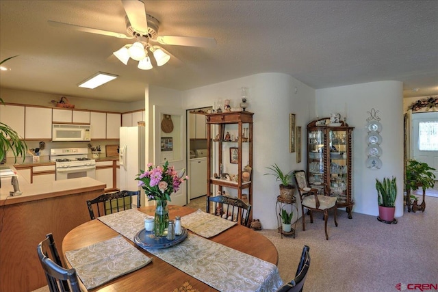 16 Mosswood Dr, Pagosa Springs, CO 81147 - dining area featuring washer / dryer, ceiling fan, and a textured ceiling