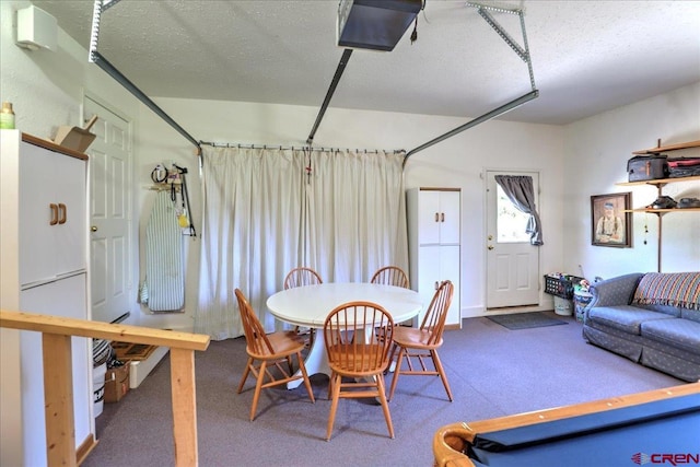 16 Mosswood Dr, Pagosa Springs, CO 81147 - carpeted dining space featuring a textured ceiling