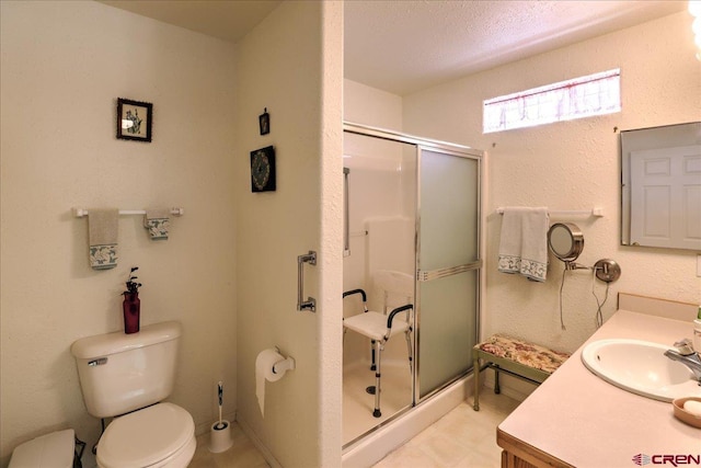 16 Mosswood Dr, Pagosa Springs, CO 81147 - full bath with toilet, a shower stall, and vanity