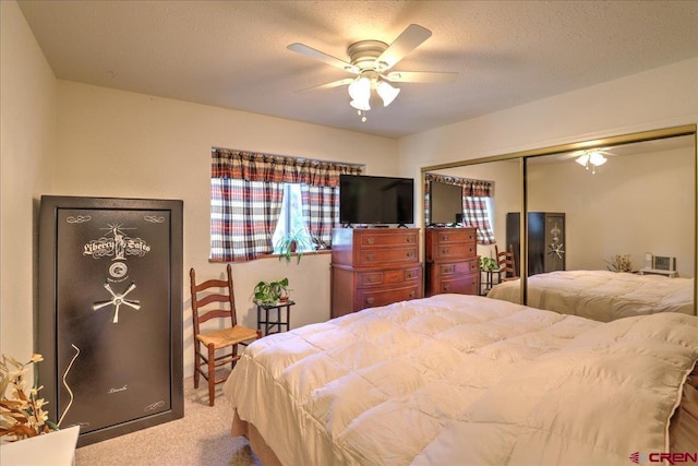 16 Mosswood Dr, Pagosa Springs, CO 81147 - carpeted bedroom with a closet and a ceiling fan