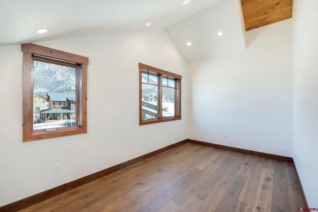 70 Lexie Ct, Crested Butte, CO 81224 - spare room with lofted ceiling, recessed lighting, baseboards, and wood finished floors