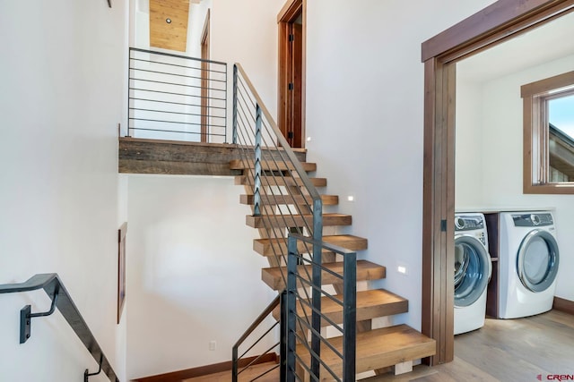 70 Lexie Ct, Crested Butte, CO 81224 - staircase with separate washer and dryer and wood finished floors
