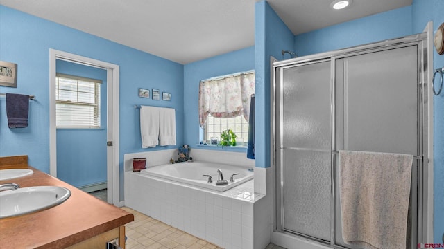 2384 Ridge Circle Dr Unit 14, Grand Junction, CO 81507 - bathroom with healthy amount of natural light, a shower stall, and a garden tub
