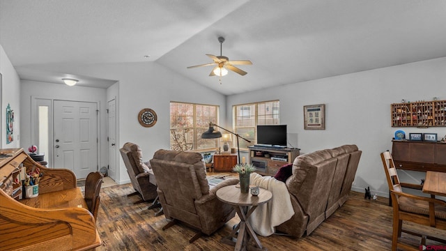 2384 Ridge Circle Dr Unit 14, Grand Junction, CO 81507 - living area with wood finished floors, a ceiling fan, vaulted ceiling, and baseboards