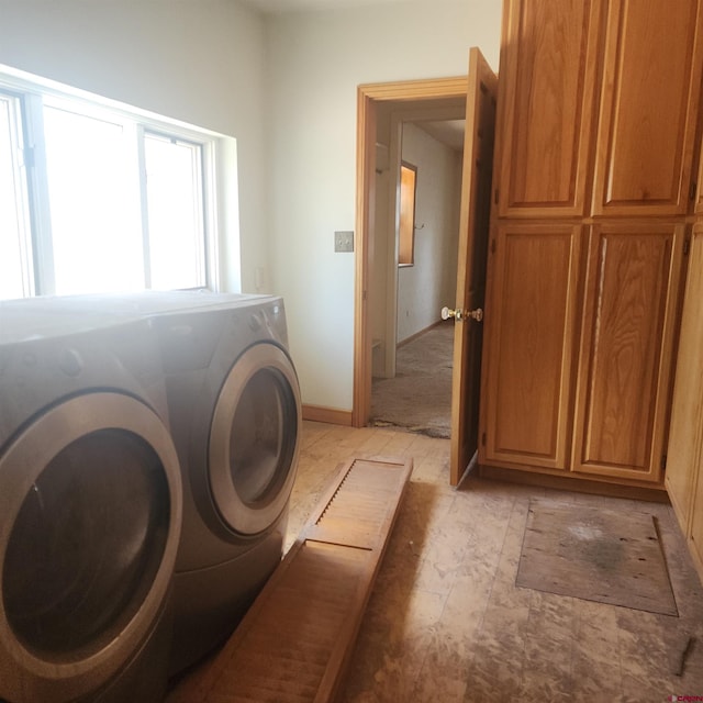 1016 Ln 12 N, Hooper, CO 81136 - clothes washing area with washer and clothes dryer, cabinet space, and baseboards