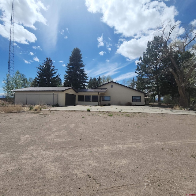 1016 Ln 12 N, Hooper, CO 81136 - view of front of property with an attached garage
