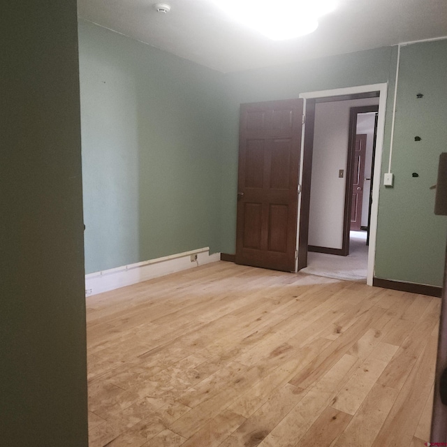 1016 Ln 12 N, Hooper, CO 81136 - unfurnished room featuring light wood-style floors and baseboards