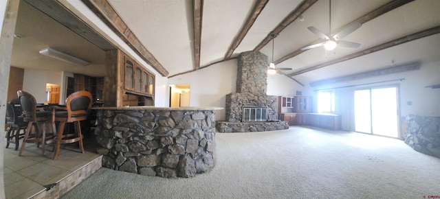1016 Ln 12 N, Hooper, CO 81136 - carpeted living area featuring ceiling fan, a stone fireplace, and bar area