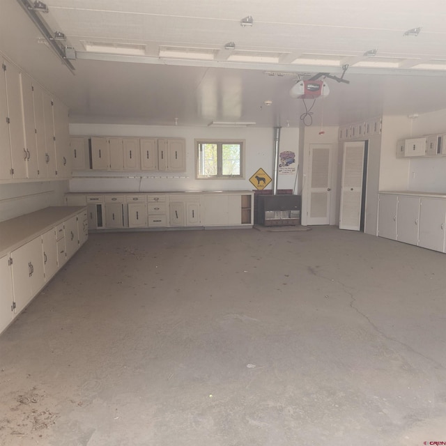 1016 Ln 12 N, Hooper, CO 81136 - garage featuring a garage door opener