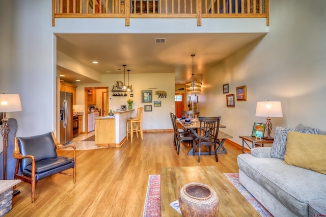135 Eaton Dr Unit 1012, Pagosa Springs, CO 81147 - living room with light wood-style flooring, baseboards, and recessed lighting