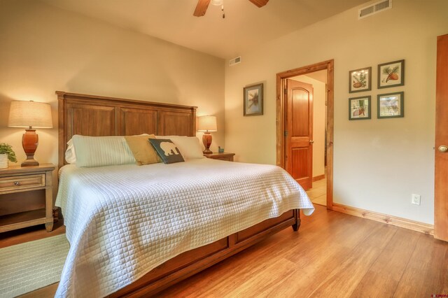 135 Eaton Dr Unit 1012, Pagosa Springs, CO 81147 - bedroom featuring light wood-type flooring, ceiling fan, and baseboards