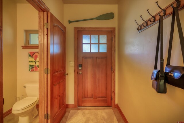 135 Eaton Dr Unit 1012, Pagosa Springs, CO 81147 - doorway with baseboards and light tile patterned flooring