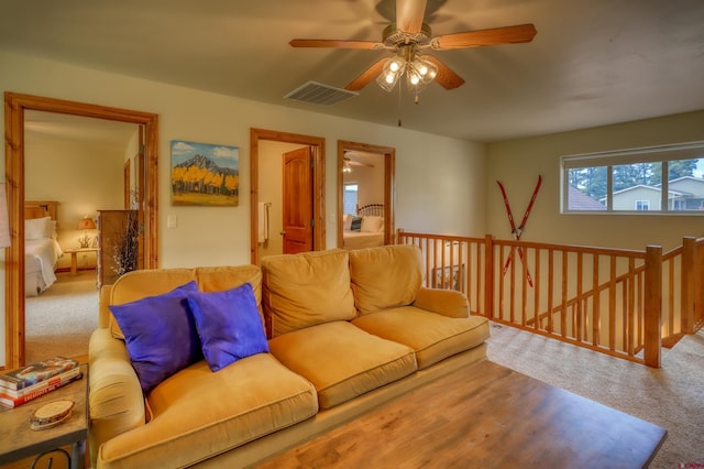 135 Eaton Dr Unit 1012, Pagosa Springs, CO 81147 - carpeted living room with ceiling fan
