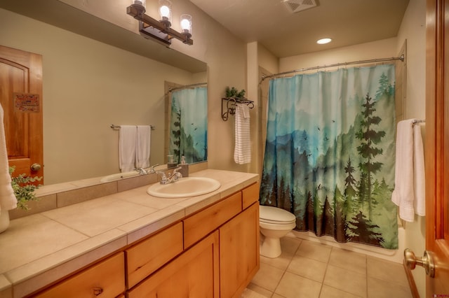 135 Eaton Dr Unit 1012, Pagosa Springs, CO 81147 - full bathroom featuring tile patterned flooring, vanity, toilet, a shower with curtain, and recessed lighting