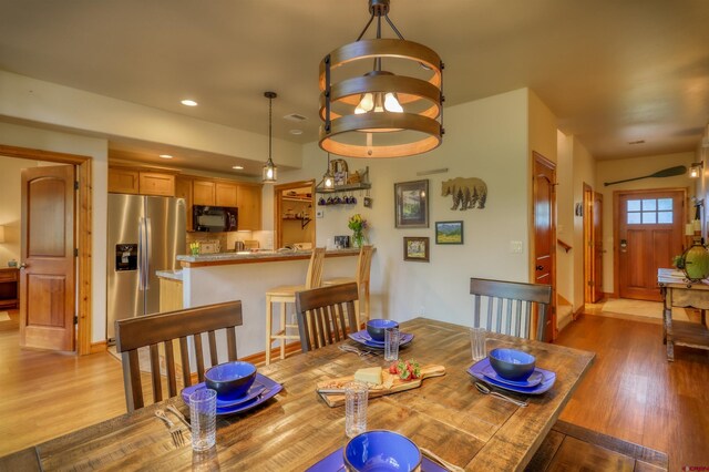 135 Eaton Dr Unit 1012, Pagosa Springs, CO 81147 - dining space featuring light wood finished floors and recessed lighting