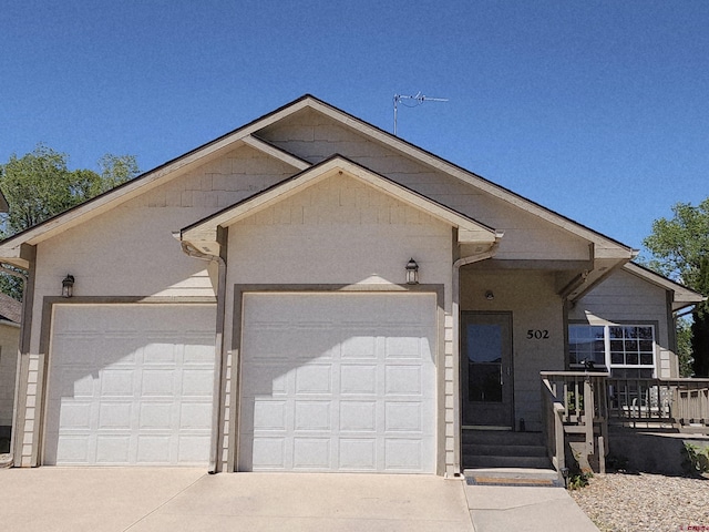 502 S Juniper Pl, Cortez, CO 81321 - ranch-style house featuring driveway and an attached garage
