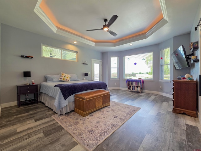 1771 Trappers Ct, Delta, CO 81416 - bedroom with a tray ceiling, wood finished floors, baseboards, ornamental molding, and ceiling fan